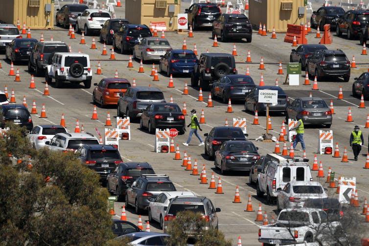 coronavirus testing site in Los Angeles with cars.