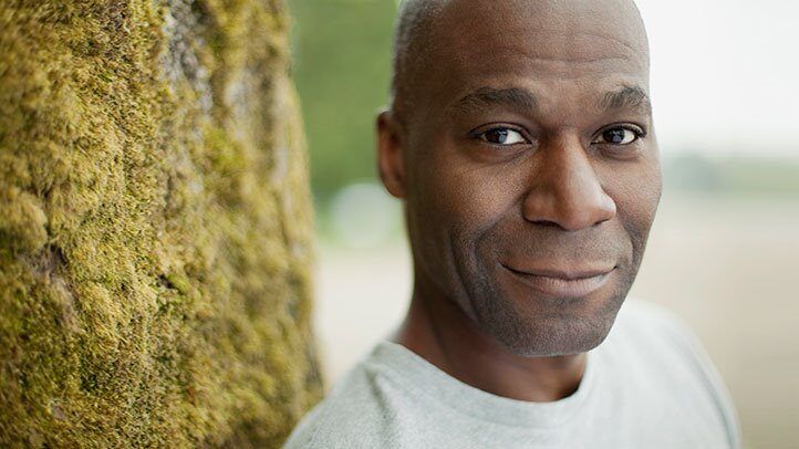 a man with prostate cancer standing outside