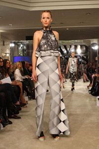 A model shows off a pair of bell-bottomed pants during a runway show in Sydney, Australia, in 2010.