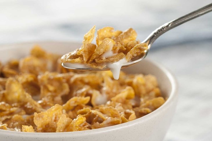 Cereal bowl and spoon with milk